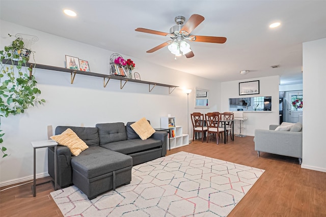 4304 Sherwood Ln Unit 106, Houston, TX 77092 - living area with a ceiling fan, wood finished floors, recessed lighting, and baseboards