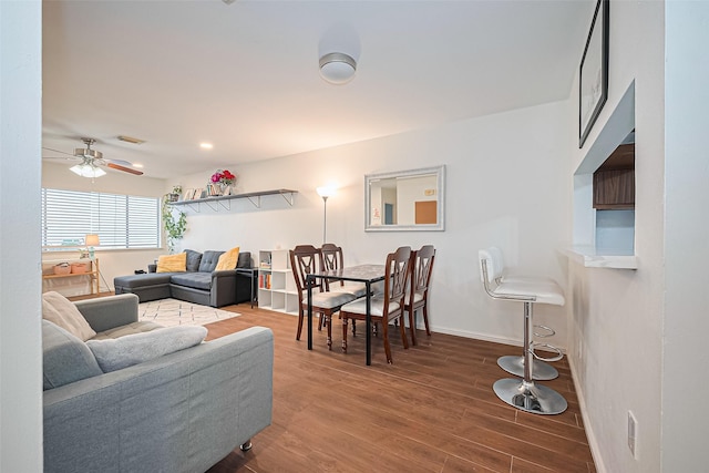 4304 Sherwood Ln Unit 106, Houston, TX 77092 - living room featuring wood finished floors, ceiling fan, and baseboards