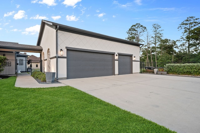 27494 S Lazy Meadow Way, Spring, TX 77386 - view of property exterior with driveway, a garage, and stucco siding