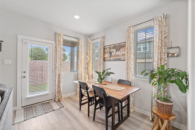 3125 Skyrock Dr, Houston, TX 77063 - dining area with plenty of natural light, wood finished floors, baseboards, and recessed lighting