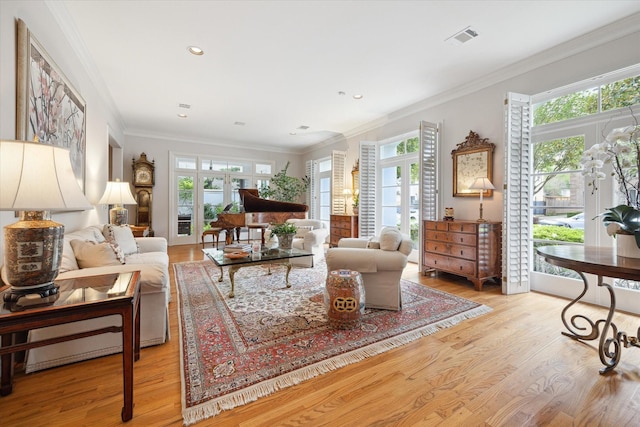 3633 Overbrook Ln, Houston, TX 77027 - living room featuring wood finished floors, healthy amount of natural light, crown molding, and recessed lighting