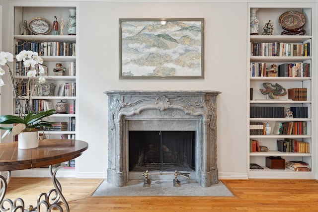 3633 Overbrook Ln, Houston, TX 77027 - detailed view of wood finished floors and a fireplace