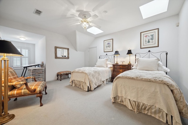 3633 Overbrook Ln, Houston, TX 77027 - bedroom with a skylight, carpet floors, baseboards, a ceiling fan, and lofted ceiling