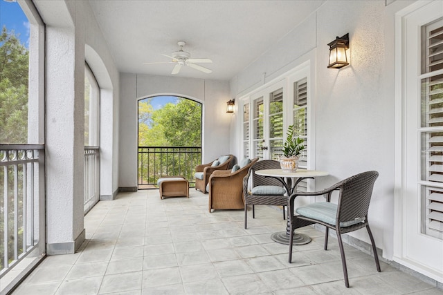 3633 Overbrook Ln, Houston, TX 77027 - sunroom / solarium featuring a textured wall and french doors