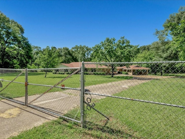 4449 Benton Rd, Lufkin, TX 75901 - view of property's community with a gate