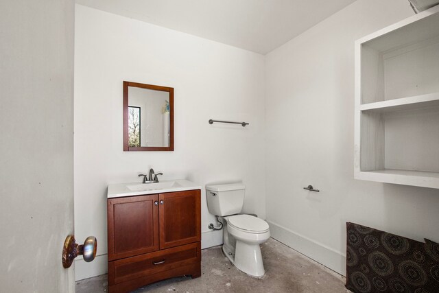 3610 Wellspring Lake Dr, Fulshear, TX 77441 - half bathroom with toilet, vanity, unfinished concrete flooring, and baseboards