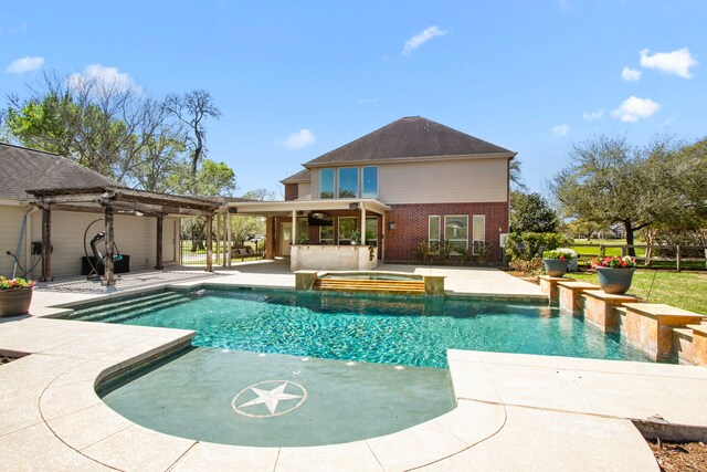 3610 Wellspring Lake Dr, Fulshear, TX 77441 - view of swimming pool featuring a patio and a pool with connected hot tub