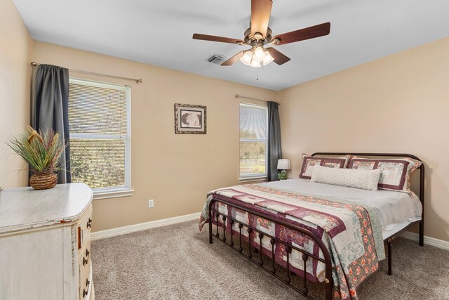 3610 Wellspring Lake Dr, Fulshear, TX 77441 - bedroom with baseboards, carpet floors, and ceiling fan