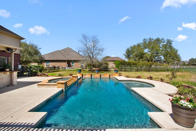 3610 Wellspring Lake Dr, Fulshear, TX 77441 - view of pool featuring a patio and a pool with connected hot tub