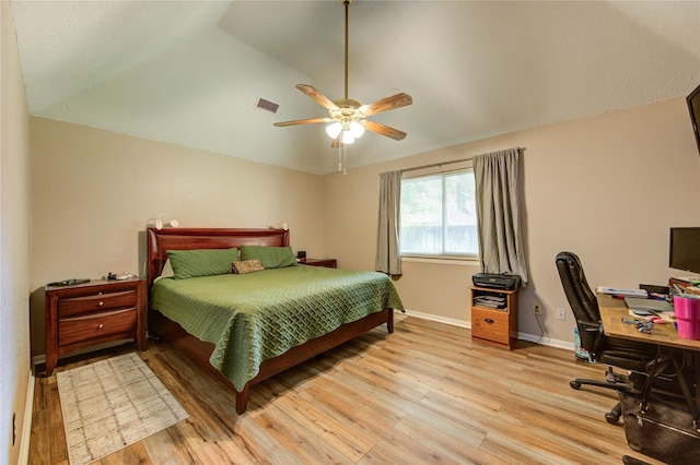 14927 Cypress Green Dr, Cypress, TX 77429 - bedroom featuring lofted ceiling, wood finished floors, a desk, baseboards, and ceiling fan