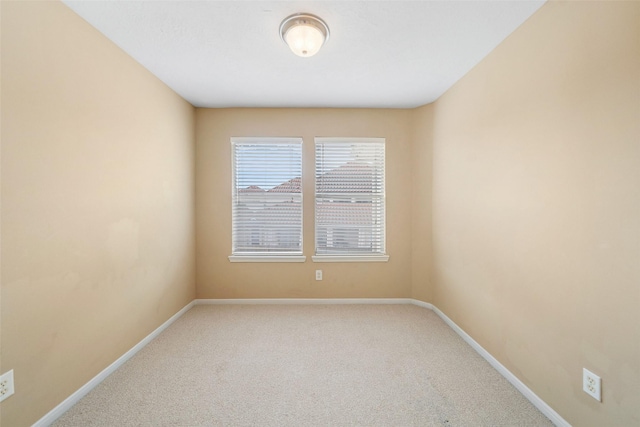 26 Oakmont Ct, Jersey Village, TX 77064 - carpeted spare room featuring baseboards