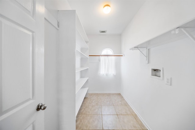 26 Oakmont Ct, Jersey Village, TX 77064 - walk in closet featuring light tile patterned floors