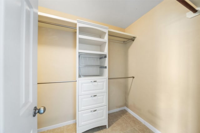 26 Oakmont Ct, Jersey Village, TX 77064 - walk in closet with light tile patterned floors