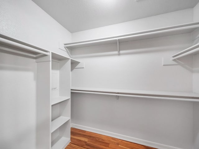 6633 W Airport Blvd Unit 1106, Houston, TX 77035 - spacious closet with wood finished floors