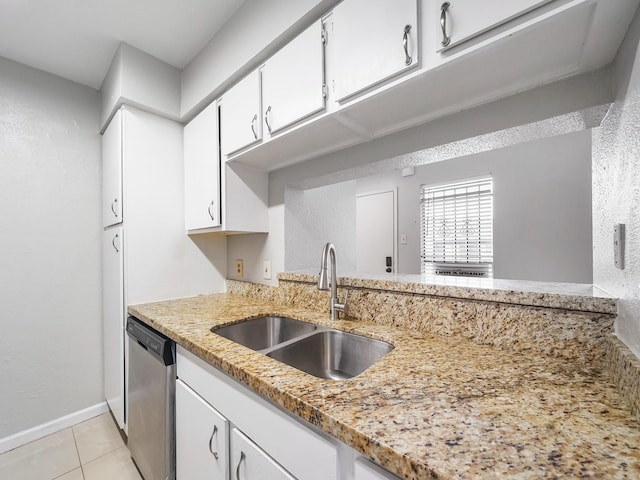 6633 W Airport Blvd Unit 1106, Houston, TX 77035 - kitchen with dishwasher, a sink, white cabinetry, light tile patterned floors, and light stone counters