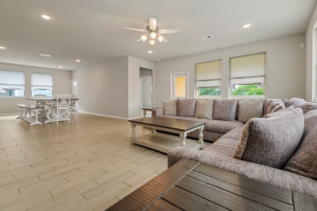 269 Bay Oaks Dr, La Porte, TX 77571 - living area featuring baseboards, a ceiling fan, wood finished floors, and recessed lighting