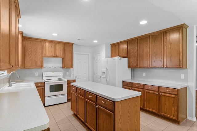 27017 Del Rio Trl W, Magnolia, TX 77355 - kitchen featuring white appliances, a sink, light tile patterned flooring, light countertops, and recessed lighting