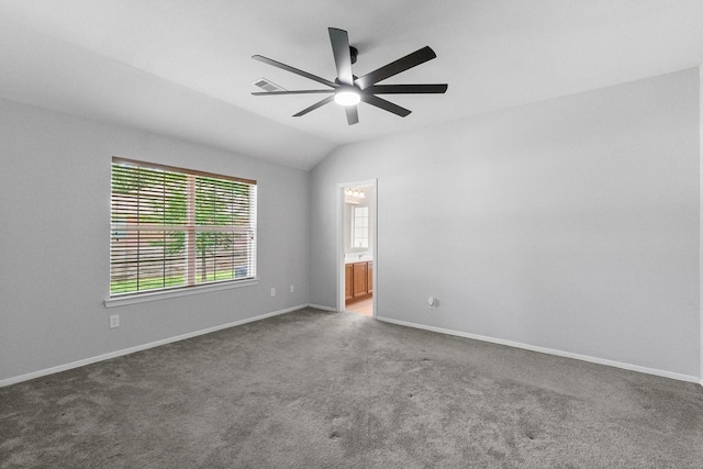 27017 Del Rio Trl W, Magnolia, TX 77355 - carpeted empty room with vaulted ceiling, ceiling fan, and baseboards