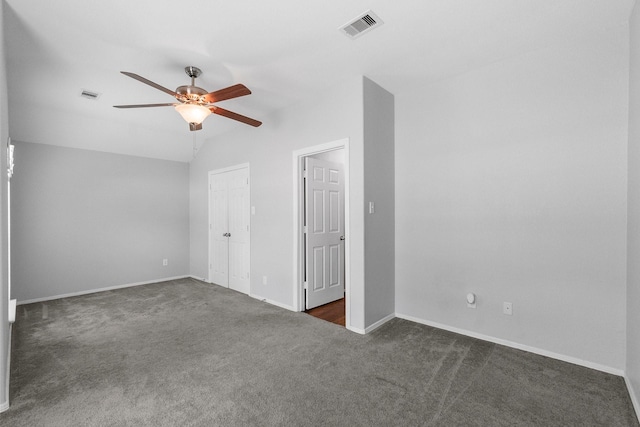 27017 Del Rio Trl W, Magnolia, TX 77355 - unfurnished bedroom featuring dark carpet, baseboards, and ceiling fan