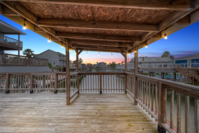 1407 Tiki Dr, Tiki Island, TX 77554 - wooden deck featuring a residential view and a water view