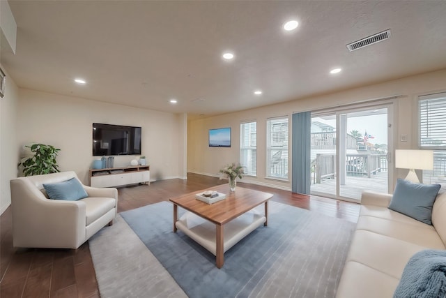 1407 Tiki Dr, Tiki Island, TX 77554 - living room with wood finished floors, recessed lighting, and baseboards
