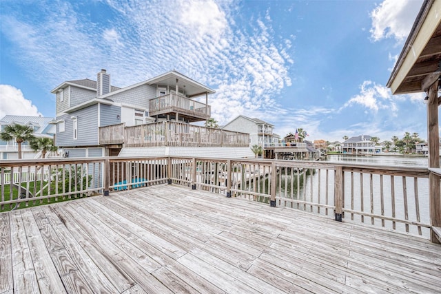 1407 Tiki Dr, Tiki Island, TX 77554 - deck featuring a water view