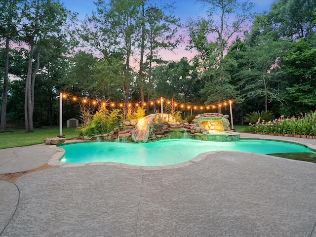 32411 Autumn Forest Ct, Magnolia, TX 77354 - swimming pool with a patio area, a hot tub, and a storage unit