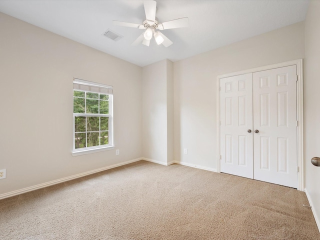 32411 Autumn Forest Ct, Magnolia, TX 77354 - unfurnished bedroom with carpet flooring, a closet, and baseboards