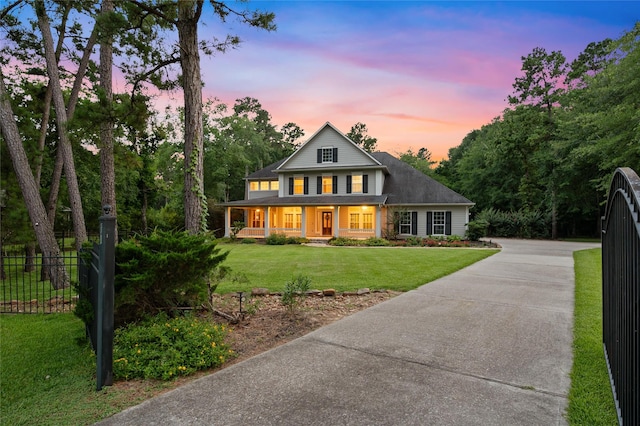 32411 Autumn Forest Ct, Magnolia, TX 77354 - view of front of home with driveway and a porch