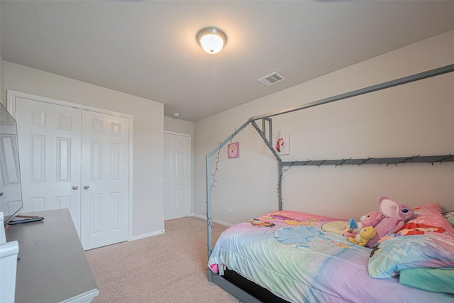 3813 Kirby Ct, Texas City, TX 77591 - bedroom with light colored carpet, baseboards, and a closet