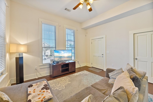 1809 31st St, Galveston, TX 77550 - living room featuring a ceiling fan, wood finished floors, and baseboards