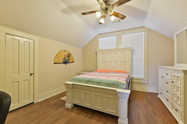 1809 31st St, Galveston, TX 77550 - bedroom with vaulted ceiling, dark wood-style floors, baseboards, and a ceiling fan