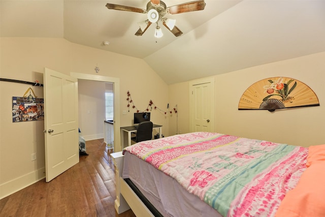 1809 31st St, Galveston, TX 77550 - bedroom featuring vaulted ceiling, wood finished floors, baseboards, a desk, and ceiling fan