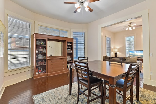 1809 31st St, Galveston, TX 77550 - dining area with a ceiling fan, wood finished floors, and baseboards