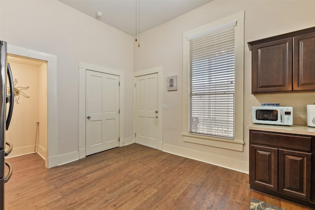 1809 31st St, Galveston, TX 77550 - foyer entrance featuring light wood-style floors and baseboards