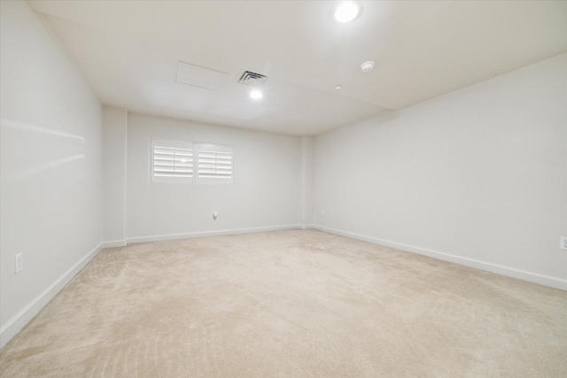 914 Main St Unit 1104, Houston, TX 77002 - unfurnished room featuring light carpet, attic access, baseboards, recessed lighting, and a smoke detector