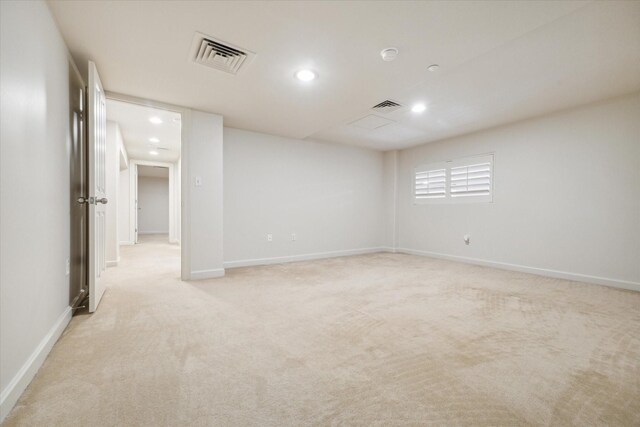 914 Main St Unit 1104, Houston, TX 77002 - spare room featuring recessed lighting, light colored carpet, and baseboards