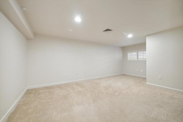 914 Main St Unit 1104, Houston, TX 77002 - unfurnished room with light carpet, baseboards, and recessed lighting