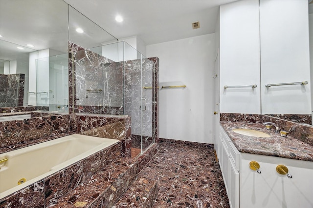 4 River Hollow Ln, Houston, TX 77027 - full bath featuring marble look tile flooring, a marble finish shower, a tub with jets, vanity, and baseboards