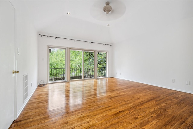 4 River Hollow Ln, Houston, TX 77027 - empty room featuring wood finished floors, ceiling fan, and baseboards