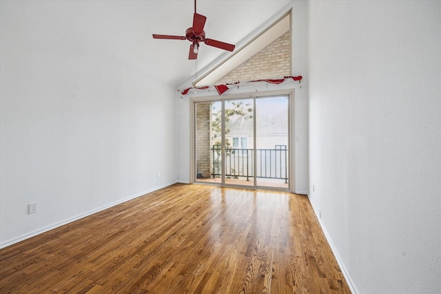 4 River Hollow Ln, Houston, TX 77027 - spare room featuring wood finished floors, a ceiling fan, baseboards, and high vaulted ceiling