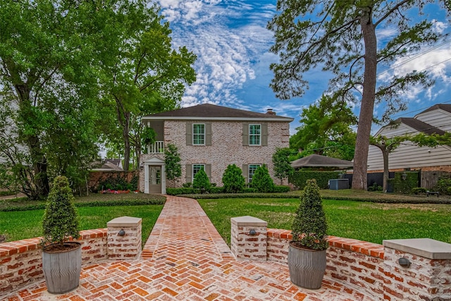 14827 River Forest Dr, Houston, TX 77079 - view of front of home featuring cooling unit and a chimney
