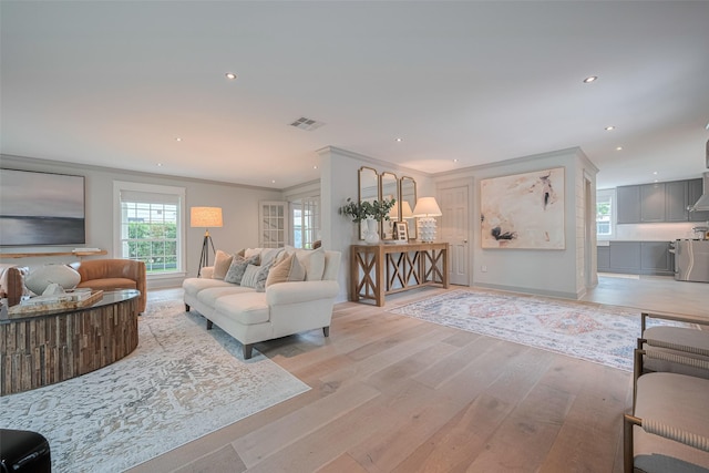 14827 River Forest Dr, Houston, TX 77079 - living area featuring light wood-style floors, recessed lighting, and baseboards