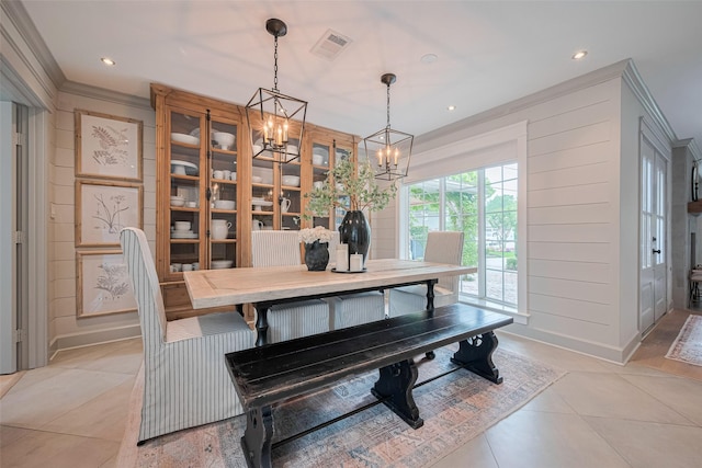 14827 River Forest Dr, Houston, TX 77079 - dining room with crown molding, a chandelier, light tile patterned floors, recessed lighting, and baseboards