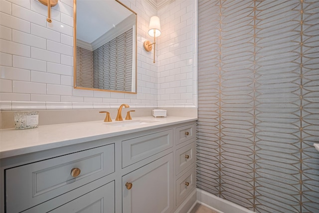 14827 River Forest Dr, Houston, TX 77079 - bathroom with tile walls, vanity, and tasteful backsplash