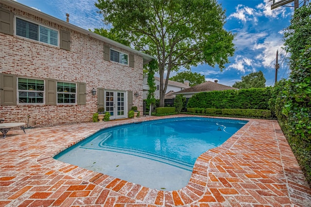 14827 River Forest Dr, Houston, TX 77079 - view of pool with french doors and a patio
