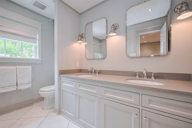 14827 River Forest Dr, Houston, TX 77079 - full bathroom with double vanity, toilet, tile patterned flooring, and ornamental molding