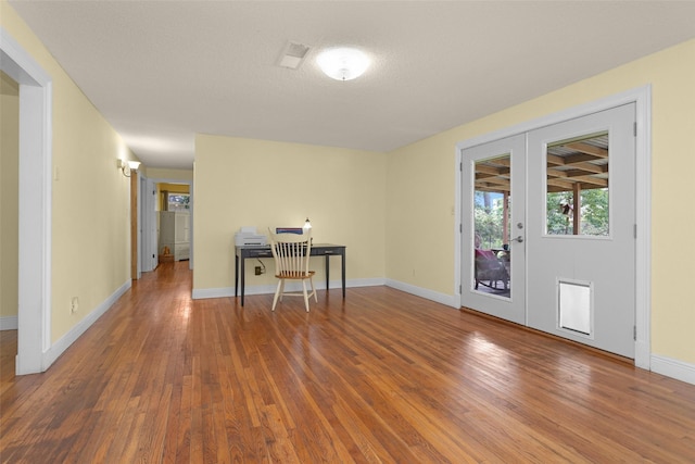 511 Northwood Dr, Conroe, TX 77303 - office featuring wood finished floors, baseboards, and french doors