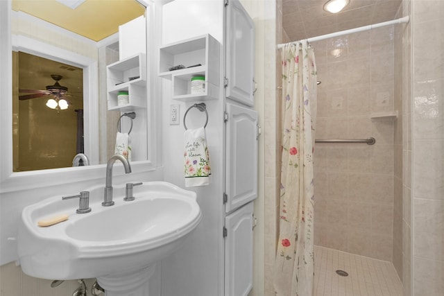 511 Northwood Dr, Conroe, TX 77303 - full bathroom with a stall shower, a sink, and a ceiling fan