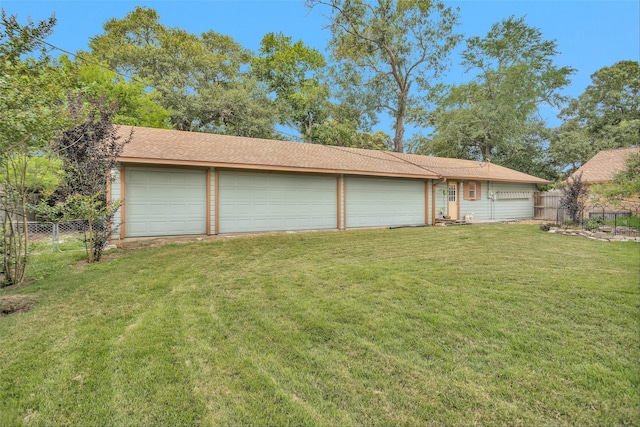 511 Northwood Dr, Conroe, TX 77303 - rear view of house featuring a garage